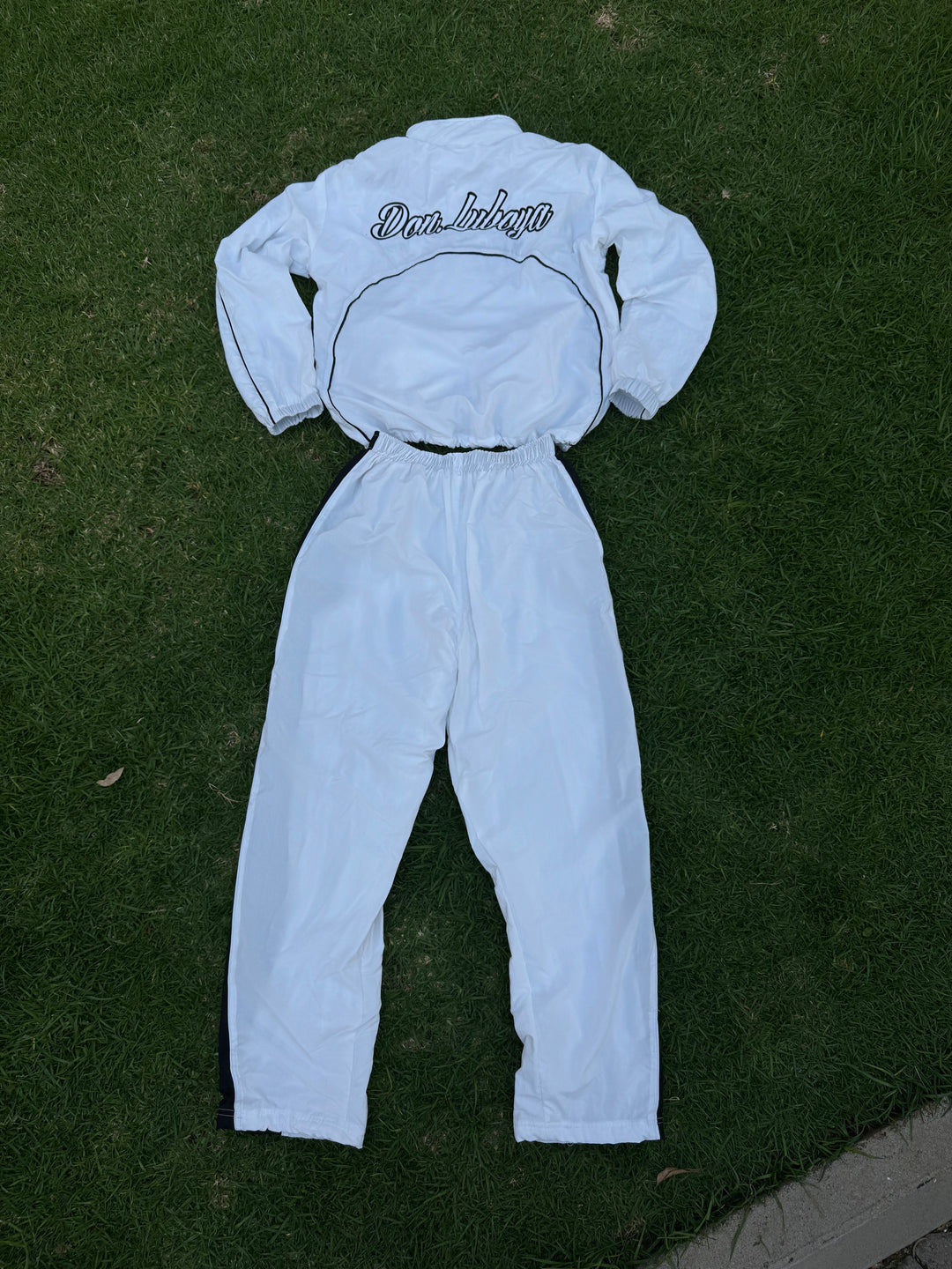 Don Luboya white tracksuit