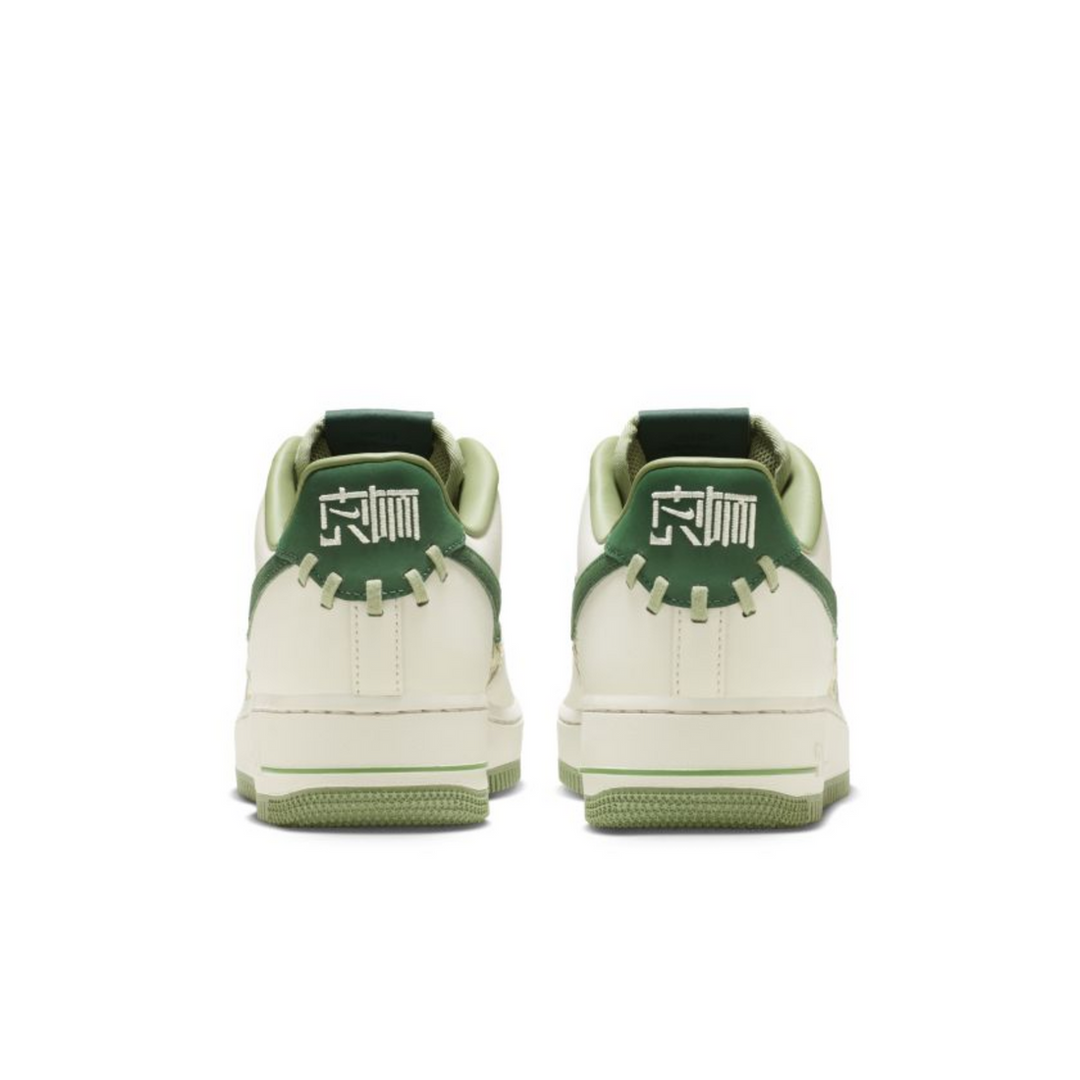 Nike Air Force 1 Low "NAI-KE" Surfaces in Green Weaves